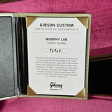 Gibson Custom Certificate of Authenticity for Murphy Lab Heavy Aging on a red background