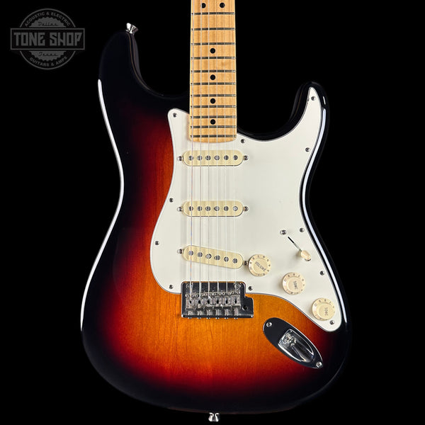 Electric guitar with sunburst finish on a black background, featuring 'Tone Shop' logo.