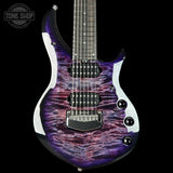 Electric guitar with a purple and black pattern on a black background, featuring the Tone Shop logo.