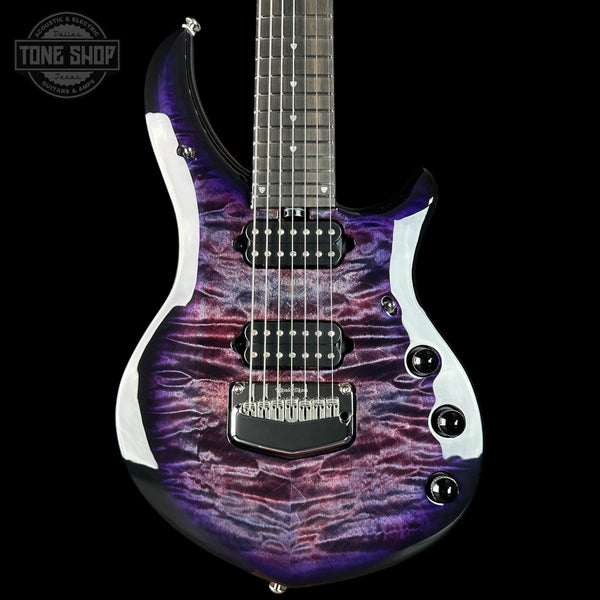 Electric guitar with a purple and black pattern on a black background, featuring the Tone Shop logo.