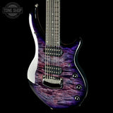 Purple electric guitar with a black background, featuring the 'Tone Shop' logo.