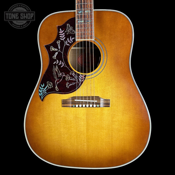 Front of Gibson Hummingbird Elegant Koa Left Handed Honey Burst.