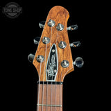 Guitar headstock with 'Fender' logo on a black background