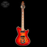 Red electric guitar on a black background with 'Tone Shop' logo.