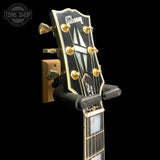 Headstock of Used 2006 Gibson Custom Shop Les Paul Custom Ebony.