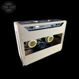 Guitar amplifier with 'Tone Shop' logo in the corner
