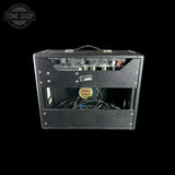 Guitar amplifier with visible brand logo on a black background