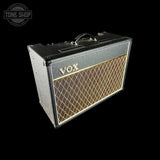 VOX guitar amplifier on a black background with 'Tone Shop' logo.