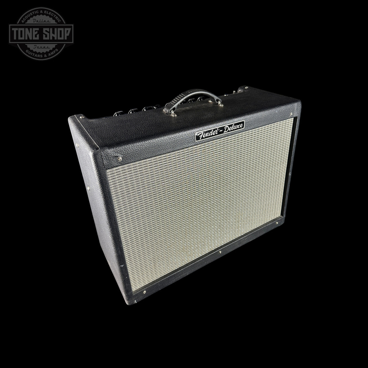 Fender Deluxe guitar amplifier on a black background with 'Tone Shop' logo.