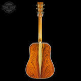 Wooden acoustic guitar on a black background with 'Tone Shop' logo.