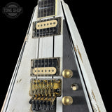 Front angle of Jackson Custom Shop USA Special Edition Rhoads Snow White/Black Pins.