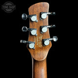 Guitar headstock with tuning pegs on a black background, featuring 'Tone Shop' logo.