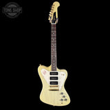 Electric guitar with a white pickguard on a black background, featuring the Tone Shop logo.