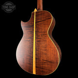 Wooden guitar body with a visible brand logo in the corner