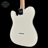 Fender Telecaster electric guitar body in glossy white, shown from the back against a solid black background. The natural wood neck is visible at the top, and the Fender logo plate is clearly visible on the backplate.