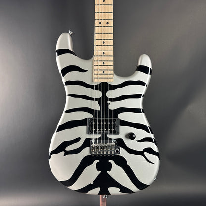 Guitar with zebra pattern on a gray background