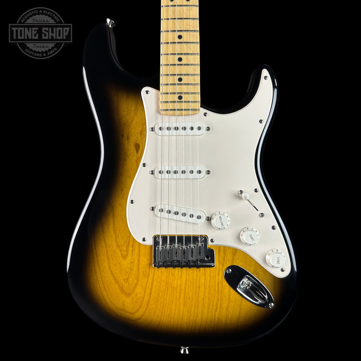 Electric guitar with a sunburst finish on a black background, featuring the Tone Shop logo.
