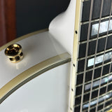 Discoloration in binding of Used Epiphone Inspired by Gibson Les Paul Custom.