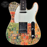 A custom electric guitar with a white pickguard and black hardware, decorated with a vintage postage stamp collage pattern in various colors. The brand 'Tone Shop' is visible as a watermark in the top left corner.
