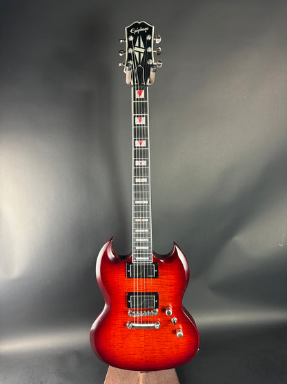 Electric guitar with a sunburst finish on a gray background