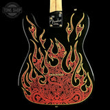 Fender Telecaster electric guitar body featuring a custom red and gold flame and paisley graphic on a glossy black finish, shown against a black background.