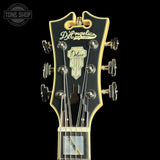 Guitar headstock with 'D'Angelico' branding on a black background