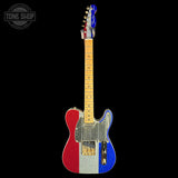 A custom electric guitar with a red, white, and blue glitter-finish body, a maple neck, and gold hardware, shown against a solid black background with a Tone Shop watermark in the top left corner.