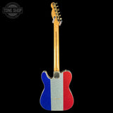 A Fender Telecaster-style electric guitar shown from the back, featuring a glittery French flag body with blue, white, and red vertical stripes, and a natural maple neck against a black background.