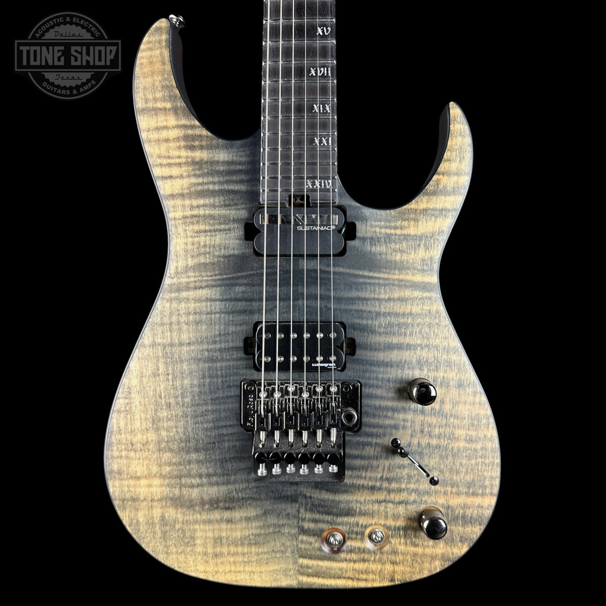 Electric guitar with a sunburst finish on a black background, featuring the Tone Shop logo.
