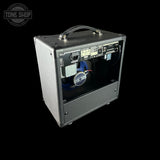 Guitar amplifier with visible brand logo on a black background
