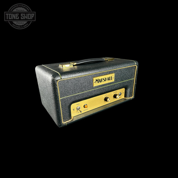Marshall amplifier head with gold accents on a black background
