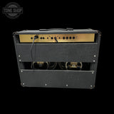 Guitar amplifier with visible brand logo on a black background
