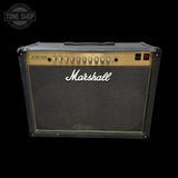 Marshall guitar amplifier with 'JCM 900' model on a black background