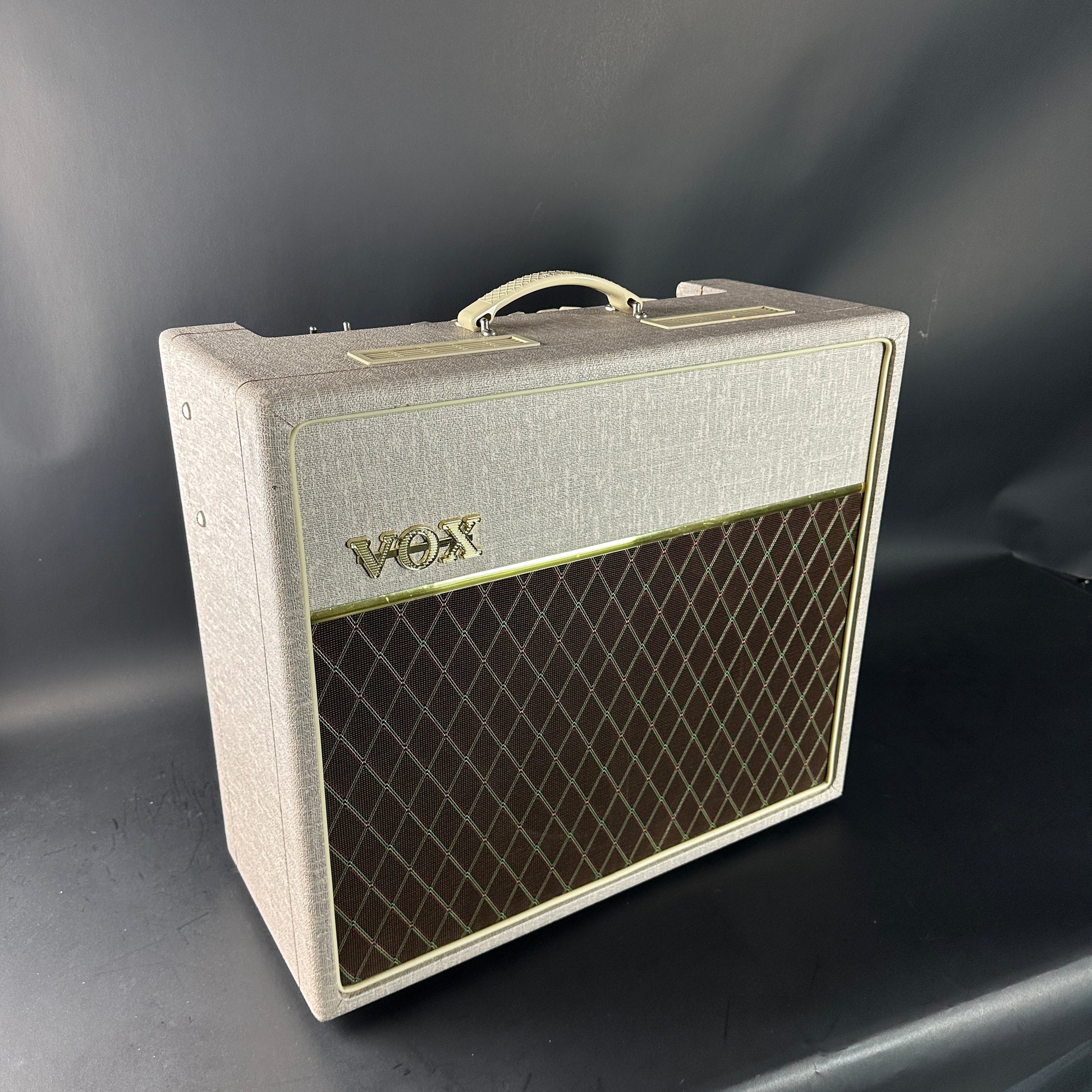 Vintage Vox guitar amplifier on a dark background