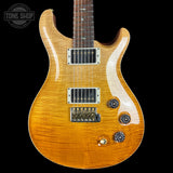 Front of Used PRS TSG Anniversary Wood Library Artist DGT Gold Storm Fade/Braz RW.