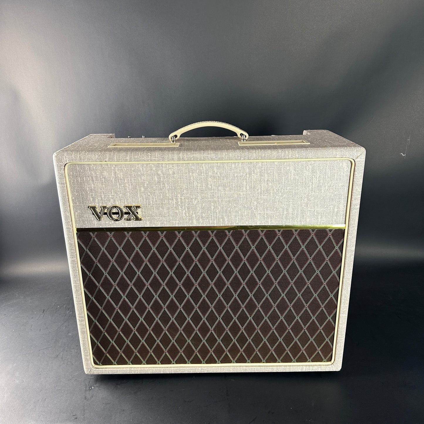 VOX guitar amplifier on a dark background