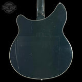 Back view of a guitar with 'Tone Shop' branding in the corner.