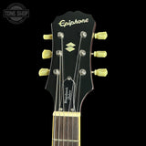 Epiphone guitar headstock with black background
