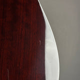 Scratch on back of Used Taylor 410E LTD Baritone Sunburst.