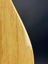Close-up of a wooden surface with a dark background