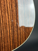 Close-up of a wooden surface with a metal edge