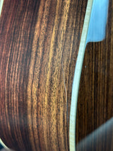 Close-up of a wooden surface with a metal edge