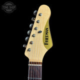 Guitar headstock with 'Friedman' branding on a black background