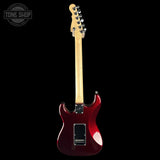 A red electric guitar shown from the back against a solid black background, featuring a glossy dark red body, a natural wood neck, and a black pickguard with 'WASHINGTON' printed on it.