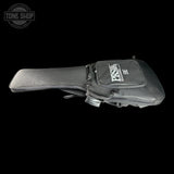 A black padded guitar headstock bag with a front zippered pocket featuring a white 'TONE SHOP' logo, shown against a solid black background.