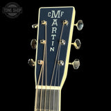 Guitar headstock with 'Martin' branding on a black background