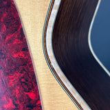Close-up of a guitar with a focus on the neck and body