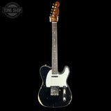 Electric guitar with a black pickguard on a white background, featuring 'Tone Shop' branding.