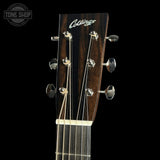 Collings guitar headstock with brand name on a black background