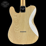 The back of a Fender Telecaster electric guitar made of natural ash wood, featuring a white maple inlay on the body and a black Fender logo plate on the neck joint, shown against a solid black background.